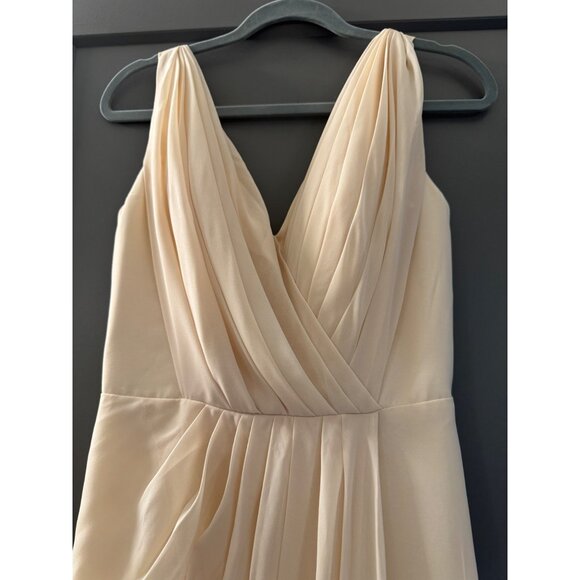 Elegant Floor-Length Cream Gown With Pleated V-Neckline & Flowing Hemline Sleeve - Picture 3 of 5